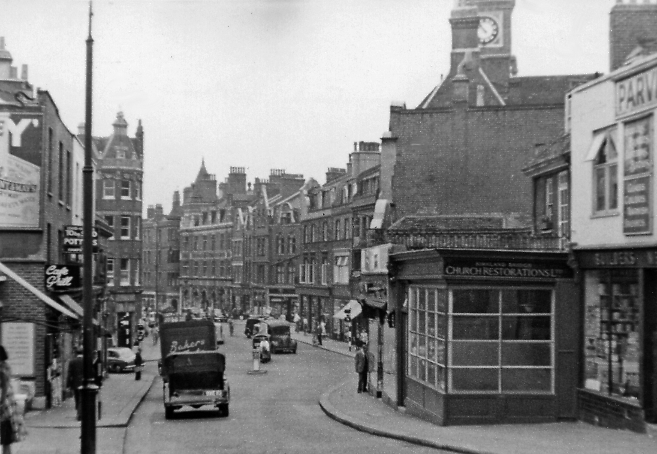 Hampstead: view southward on Heath Street past Underground Station (1955)